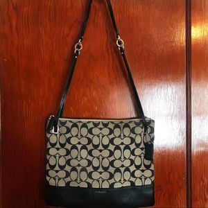 Black and greyish brown Coach purse